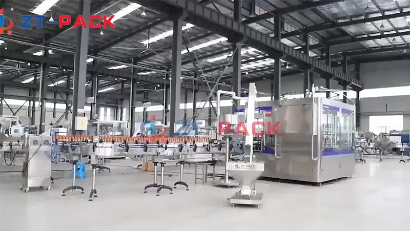 Línea de llenado de aceite lubricante rotativa